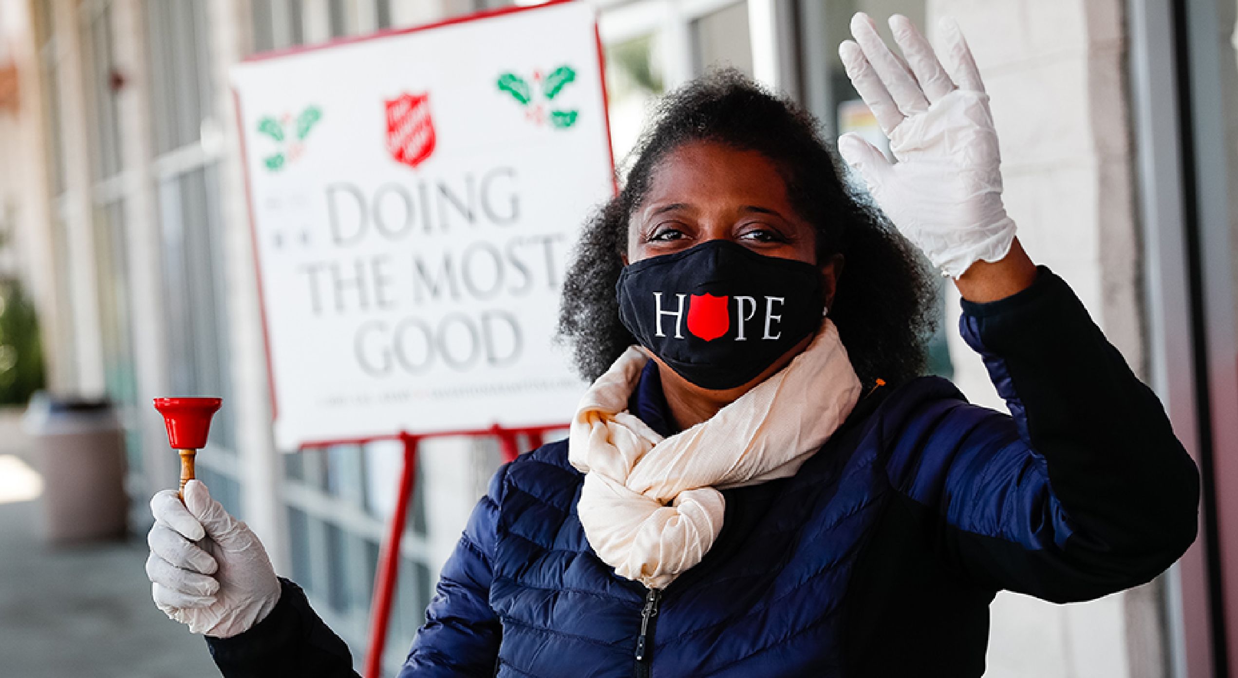 Salvation Army worker waving